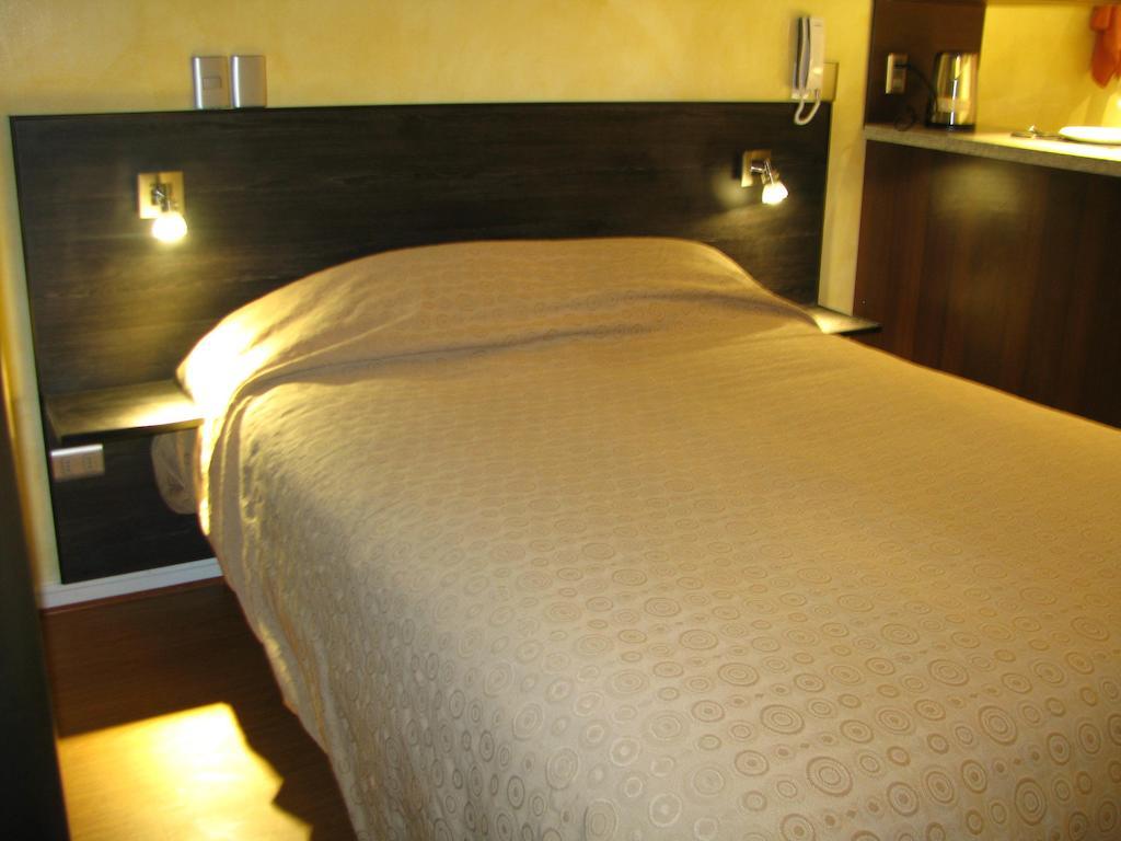 Amg Apartments Santiago Quarto foto